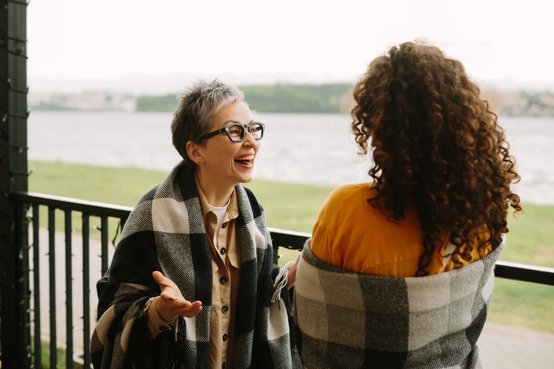 Two women talking and reflecting together